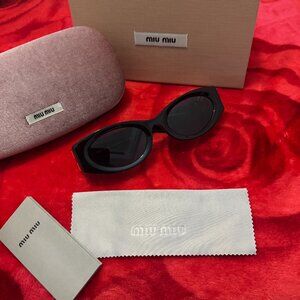 Miu Miu Black Sunglasses with Gold Logo – Chic Statement Vibes